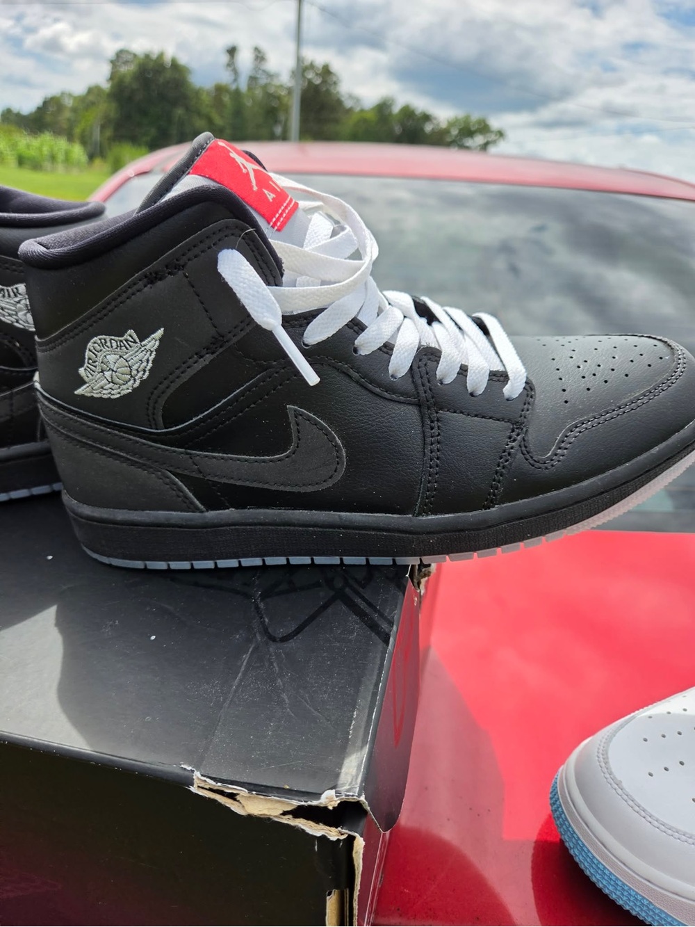 Jordan Mid-Top Sneakers in Black with White Laces and Red Tongue Tab